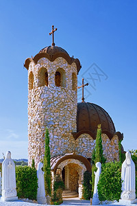 钟楼天空蓝下的小石教堂保加利亚小石教堂保加利亚小石教堂观光图片