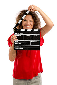 目的行业一个笑中年黑发女人肖像拿着一个拍手板到期图片