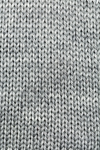 针织垫天然羊毛缝合的灰色编织背景复古的图片