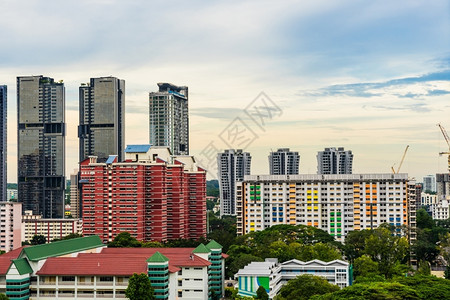 蓝色的天空新加坡市中心有摩天大楼和传统公寓新加坡大厦日落城市图片