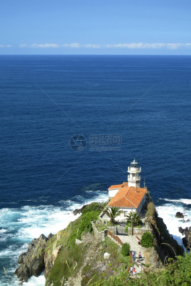 历史水海浪CudillerosLigthhouseCliffsandHugeRocksCudillero阿斯图里亚西班牙欧洲图片