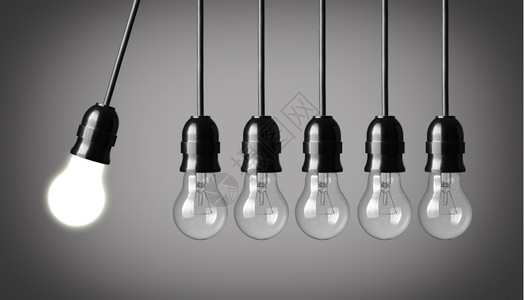 idea灯泡行动灰色的技术在背景上与灯泡Idea概念的永恒运动背景