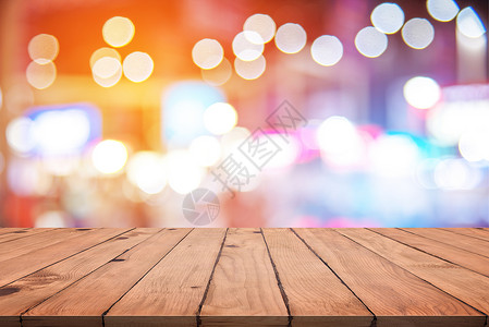 空木桌空的木桌带有多彩的抽象布基h壁纸和纹理概念灯光和产品阶段显示主题展模板的灯光和产品阶段散景商业设计图片