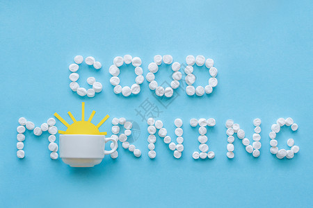 早安艺术立体字白色的早上好棉花糖和咖啡杯的早安黄色太阳照着蓝背景的黄阳升起唤醒早熟的背景