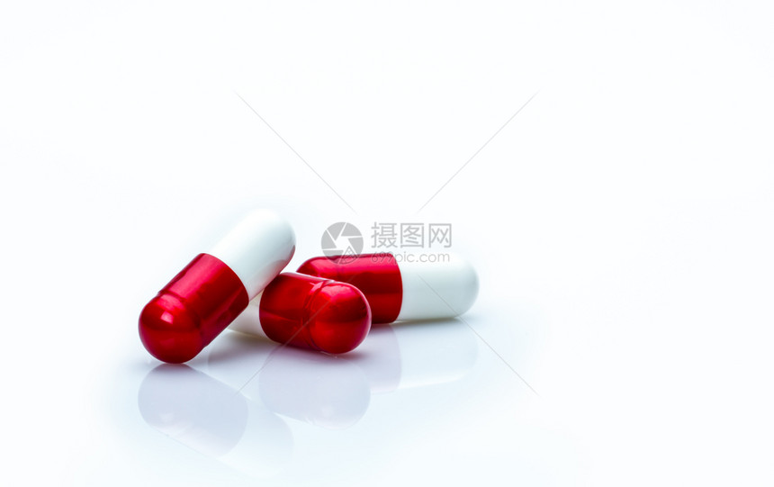 红白胶囊药丸图片