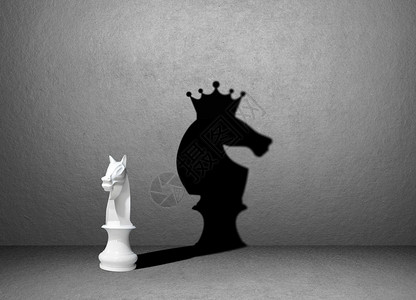 比赛黑色的胜者概念墙上的象棋阴影盘图片