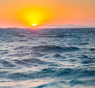 阳光热带日落夏季假背景的海浪观图片