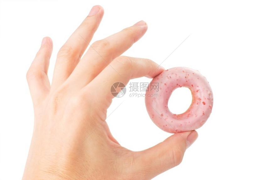 刨冰丰富多彩的甜点香圈在曼诺斯角的手上孤立在白色背景上图片