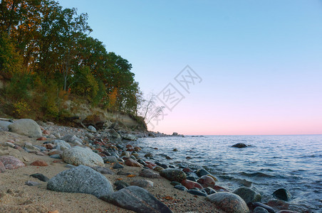 海滩云岸的日出岩石海岸的日落岩石海岸的日落早晨图片