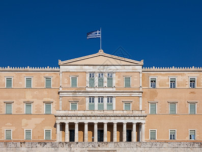 现希腊议会大楼旧皇宫的正面墙旧皇宫蓝色的外部城市图片