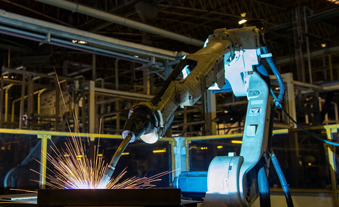 飞走一部分工业的生产刀具机器人焊接是汽车在工厂中的一部分背景