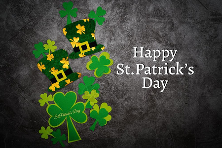 爱尔兰语装饰圣帕特里克节日礼帽和绿色假发天叶子背景