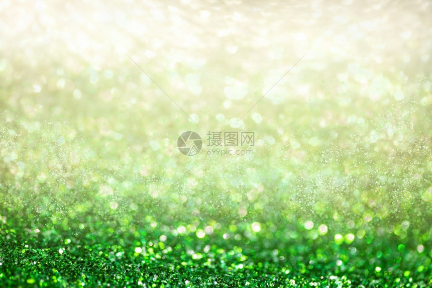 爱奢华模糊绿色亮年光灯在节庆和祝活动上不注重背景图片