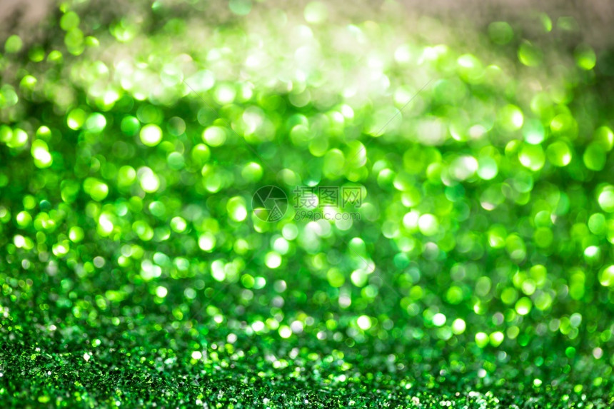 灰尘辉光生态绿色亮年光灯在节庆和祝活动上不注重背景图片