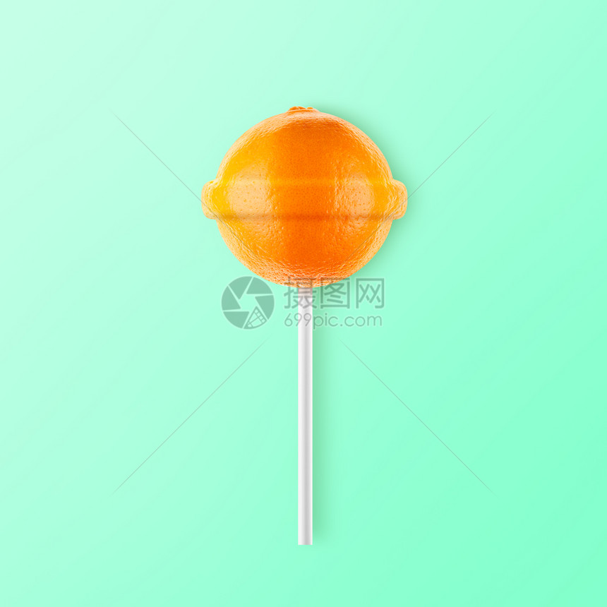 极简主义时髦的有创造力在薄荷背景上被孤立的洛丽棒子橙创意糖果想法图片