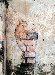 红色的废弃房屋裂墙肮脏洞图片