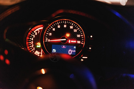 快速地多媒体现代的汽车仪表配有速度计流和指标背景图片