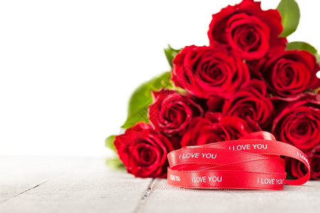 象征红玫瑰和丝带的花束照片惊喜周年纪念日图片