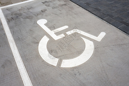 可代步的轮椅街道城市的残疾人停车处轮椅标志座符号无效的设计图片