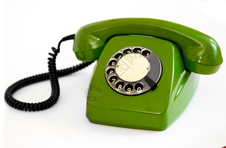 称呼技术白色背景上的复古绿色旋转电话白背景上的旧绿旋转电话通讯图片