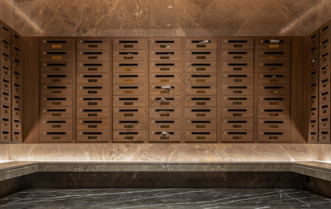 坐垫式储物柜许多用棕色木制成的邮箱放在一楼公寓大以共有式重点收看的邮箱制作正方形墙背景