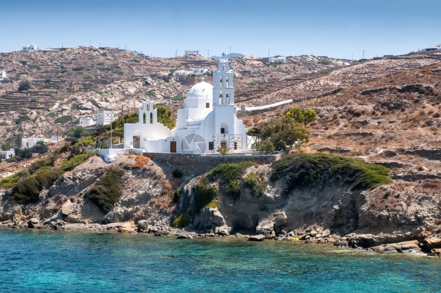 希腊帕罗斯岛的孤白教堂痣爬坡道爱琴海图片