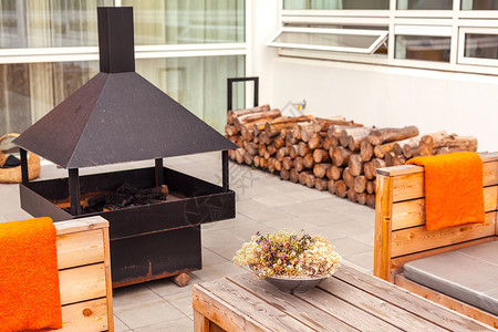 当代的室内外餐馆露台用扫描型木家具装有制符合生态友好的真人设计自然沙发背景图片