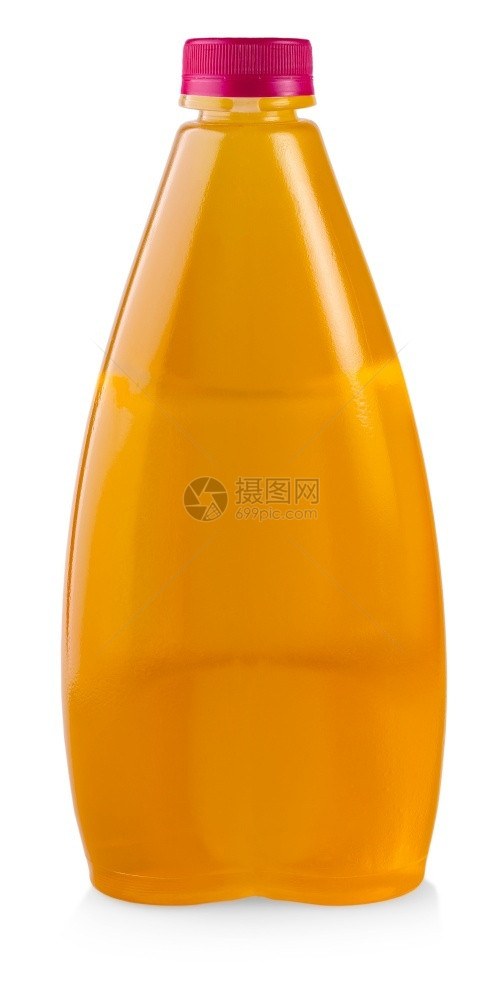 在白色背景上隔离的塑料瓶中果汁在白色背景上隔离的塑料瓶中果汁橙红色维他命图片
