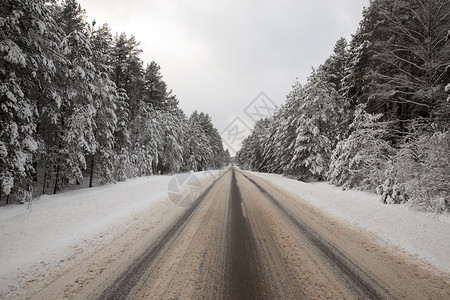 雪痕路线打印在雪地上有汽车的踪迹雪地上痕车道背景