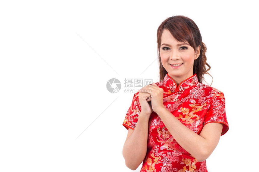 微笑亚裔女孩用传统文打招呼欢迎来宾新年希望时尚图片