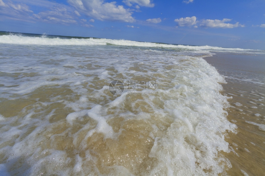 大西洋海滩的浪冲风景优美行动溅起图片