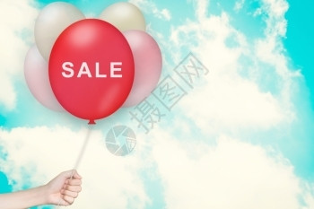 购买销售便宜的以天空和古老风格手持售卖气球背景图片