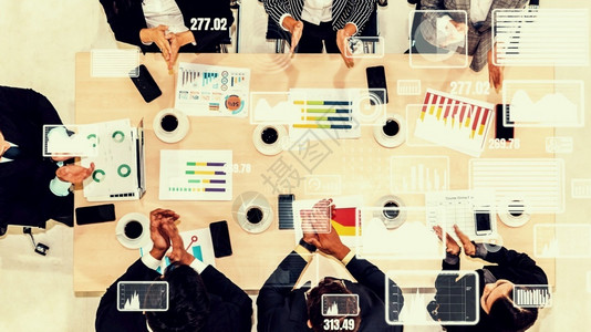 人们手企业员工会议中商务人士的创意视觉营销数据分析和投资决策的数字技术概念企业员工会议中商务人士的创意视觉友谊背景图片