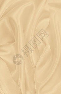 平滑优雅的金丝绸或席边奢华布质料可用作婚礼背景彩色设计用在SepiatonedRetro风格上豪华新娘金的背景图片