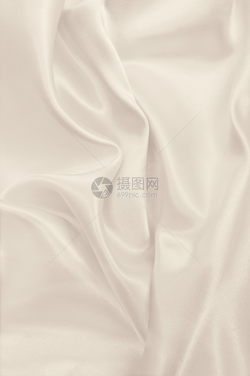 平滑优雅的金丝绸或席边奢华布质料可用作婚礼背景彩色设计用在SepiatonedRetro风格上布料服装折痕图片