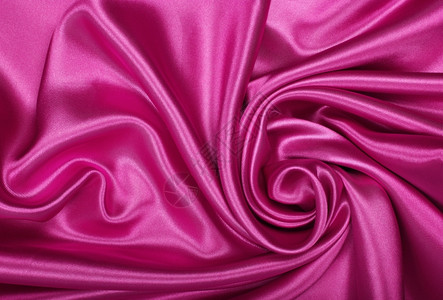 粉色的豪华平滑优雅粉色丝绸或可用作背景者图片