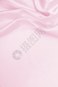 缎平滑优雅的粉色丝绸或派文纹理可用作婚礼背景材料海浪液体图片