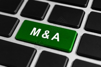 市场MampA或兼并和收购键盘上的绿色按钮商业概念投资伙伴图片