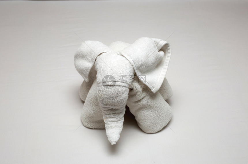 假期棉布美丽的大象形从床上的酒店毛巾卷起新的图片