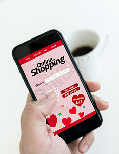 电脑细胞展示在线购物网上以手机方式为情人节买货图片