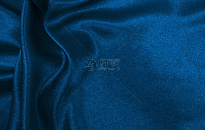 精美的自然平滑优雅的蓝色丝绸或席边奢华布质料可用作抽象背景材料如卢克吉丽圣诞背景或新年设计投标图片