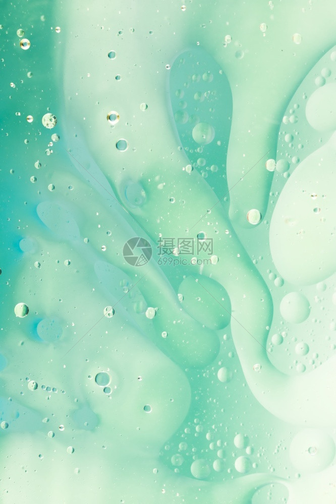 具有抽象绿色背景分辨率和高品质美丽光水泡沫具有抽象绿色背景的精密高品质和清晰度的美照片概念以及高质量和清晰度的优美照片概念飞沫透图片