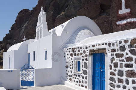 希腊圣托里尼岛红滩教堂的希腊语叉天际线图片