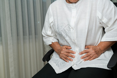 炎胰腺老年妇女在家中的胃痛老年概念的保健问题以及老年概念的保健问题便秘背景图片
