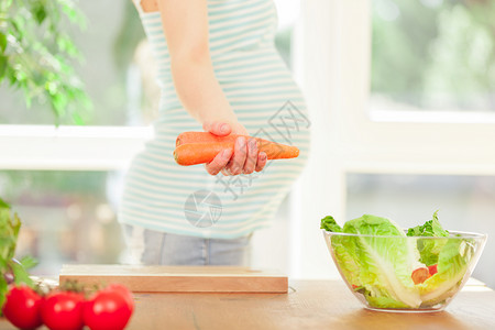 女士胃孕期健康营养概念照片怀孕期健康营养厨师烹饪高清图片素材