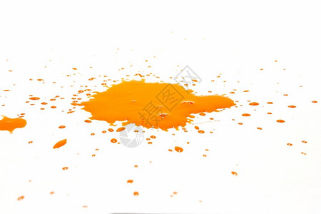 橙色水滴喷洒在白背景上动机酒精降低图片