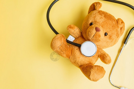 玩具熊与听诊器童年高清图片素材