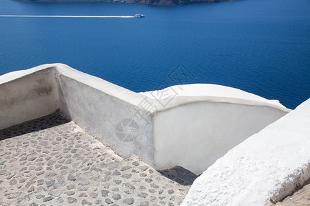 假期地标希腊语Caldera岛爱海沿岸传统白色建筑的风景旅行背圣托里尼夏天高清图片素材