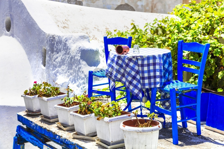 希腊纳克索岛CycadesCuteTaverns传统希腊典型街头餐馆门细节户外图片