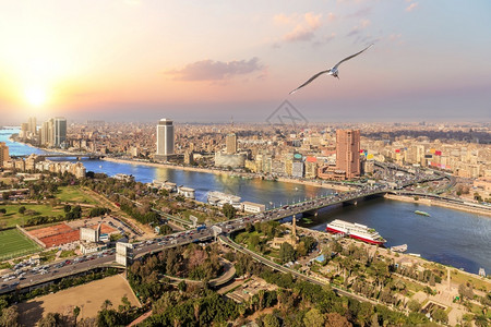 首都全景开罗和尼河观日落照片埃及清真寺酒店高清图片素材